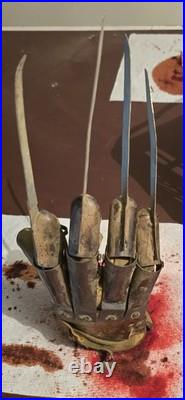 A Nightmare on Elm Street Metal Glove with stand
